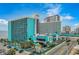 Turquoise landmark resort hotel with palm trees, parking, and street view at 1501 S Ocean Blvd. # 1042, Myrtle Beach, SC 29577