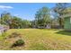 A beautiful backyard featuring a carport and green grass at 1502 Mckeithan St., Conway, SC 29526