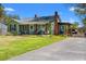 The exterior of the home featuring a green lawn and a lovely tree at 1502 Mckeithan St., Conway, SC 29526