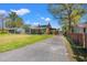 Street view of the home featuring a long driveway at 1502 Mckeithan St., Conway, SC 29526