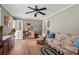 Comfortable living room with a ceiling fan and well-maintained hardwood flooring at 1502 Mckeithan St., Conway, SC 29526