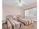 Comfortable bedroom featuring two twin beds, carpeted floors, and natural light from the window at 1505 Lanterns Rest Rd. # 101, Myrtle Beach, SC 29579