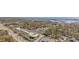 A lovely aerial view showcases a condo complex situated near a commercial area and the picturesque Intercoastal waterway at 154 Sea Shell Dr. # 16, Murrells Inlet, SC 29576