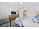 Comfortable bedroom features ensuite bathroom access, soft carpet, and lots of natural light at 154 Sea Shell Dr. # 16, Murrells Inlet, SC 29576