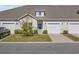 Charming home exterior with well-manicured lawn and inviting front entrance at 154 Sea Shell Dr. # 16, Murrells Inlet, SC 29576