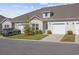 Charming home exterior featuring a well-manicured lawn and inviting front entrance at 154 Sea Shell Dr. # 16, Murrells Inlet, SC 29576