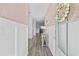 Inviting hallway with hardwood floors and a view of the front door at 154 Sea Shell Dr. # 16, Murrells Inlet, SC 29576