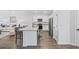 Modern kitchen with granite counters, stainless steel appliances, and island with seating at 154 Sea Shell Dr. # 16, Murrells Inlet, SC 29576
