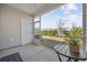 Covered, screened-in porch provides outdoor seating and views of the community at 154 Sea Shell Dr. # 16, Murrells Inlet, SC 29576