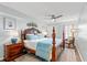 Cozy bedroom showcasing a four-poster bed, a ceiling fan, and a serene, inviting ambiance at 1625 S Ocean Blvd. # 1510, North Myrtle Beach, SC 29582
