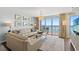 Bright living room with ocean views, stylish decor, comfortable seating, and natural light at 1625 S Ocean Blvd. # 1510, North Myrtle Beach, SC 29582