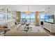 Inviting living room with ocean views, stylish decor, and comfortable seating arrangement at 1625 S Ocean Blvd. # 1510, North Myrtle Beach, SC 29582