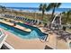 Relaxing lazy river style pool with palm trees and beach views in a tropical setting at 1625 S Ocean Blvd. # 1510, North Myrtle Beach, SC 29582