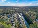 Overhead image of a residential area with mature trees, ponds, and a waterway with a pin location marker at 173 Knight Circle # 1, Pawleys Island, SC 29585