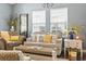 Bright and airy living room with plush seating, decorative pillows, and a serene ambiance at 173 Knight Circle # 1, Pawleys Island, SC 29585