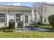 Outdoor patio space with a table and chairs set for dining, and a barbecue grill on the side at 173 Knight Circle # 1, Pawleys Island, SC 29585