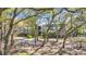 Charming condo surrounded by mature trees, enhancing the natural beauty at 178 Salt Marsh Circle # 30D, Pawleys Island, SC 29585