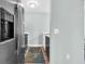 Bright kitchen featuring stainless steel appliances and a modern design with wood-look flooring at 178 Salt Marsh Circle # 30D, Pawleys Island, SC 29585