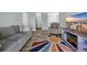 Comfortable living room area featuring modern furnishings, a sofa, and a TV at 178 Salt Marsh Circle # 30D, Pawleys Island, SC 29585