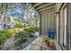 Outdoor patio area with lush landscaping and comfortable seating at 178 Salt Marsh Circle # 30D, Pawleys Island, SC 29585