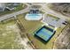 An aerial view of the neighborhood amenities, including a pool, tennis court, and parking at 2191 Gooseberry Way, Longs, SC 29568