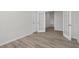 Entry foyer with hard wood floors, french doors, and neutral color palette at 2191 Gooseberry Way, Longs, SC 29568
