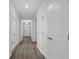 Long hallway with ample closet space and natural light at 2191 Gooseberry Way, Longs, SC 29568