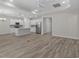 Open floor plan with views of the eat-in kitchen and access to the patio at 2191 Gooseberry Way, Longs, SC 29568