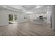 Living room with neutral paint colors, an eat-in kitchen, and lots of natural light at 2191 Gooseberry Way, Longs, SC 29568
