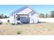 Outdoor patio and expansive yard featuring green space and modern conveniences at 2519 Southern Crest Dr., Loris, SC 29569