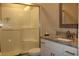 Bathroom boasts granite countertops, glass shower doors, and modern fixtures at 2519 Southern Crest Dr., Loris, SC 29569