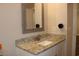 Modern bathroom vanity featuring granite countertops and bronze fixtures at 2519 Southern Crest Dr., Loris, SC 29569