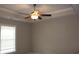 Bedroom showcasing tray ceiling, ceiling fan, and ample natural light from the window at 2519 Southern Crest Dr., Loris, SC 29569