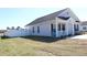 Well-maintained single story home with vinyl siding, fenced yard, and a manicured lawn at 2519 Southern Crest Dr., Loris, SC 29569