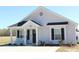 Charming single-story home featuring a cozy front porch and well-maintained landscaping at 2519 Southern Crest Dr., Loris, SC 29569
