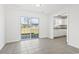 Tiled dining area featuring a sliding glass door that leads to the backyard and patio at 2633 Corn Pile Rd., Myrtle Beach, SC 29588