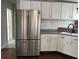 Beautiful kitchen featuring white cabinets and stainless steel refrigerator at 301 Byrnes Circle, Johnsonville, SC 29555