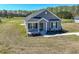 Charming single-story home with gray siding and a well-manicured front yard at 3016 Wise Rd., Conway, SC 29526