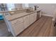 Kitchen featuring granite countertops, a stainless steel dishwasher, and stylish cabinetry at 3016 Wise Rd., Conway, SC 29526