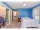 Spacious bedroom with multiple closets, ceiling fan, and natural light at 313 Blue Ridge Dr., Pawleys Island, SC 29585