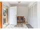 Inviting entryway with tile flooring, bench seating, and a bright view to the exterior at 313 Blue Ridge Dr., Pawleys Island, SC 29585