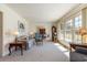 Bright and spacious living room featuring large windows and comfortable seating, perfect for Gathering gatherings at 313 Blue Ridge Dr., Pawleys Island, SC 29585
