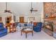 Cozy living room with a brick fireplace, comfortable seating, and plenty of space for relaxation and entertainment at 313 Blue Ridge Dr., Pawleys Island, SC 29585