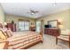 Spacious main bedroom featuring a ceiling fan, recessed lighting, and ample natural light at 313 Blue Ridge Dr., Pawleys Island, SC 29585
