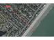 Aerial view displays property near Atlantic Ocean showcasing proximity to the beach at 318 15Th Ave. S, Surfside Beach, SC 29575