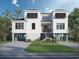 Inviting two-story coastal home featuring a charming staircase, elevated design and lush tropical landscaping at 318 15Th Ave. S, Surfside Beach, SC 29575