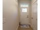 Welcoming foyer with a decorative front door window, neutral walls, and durable flooring at 341 Golan Circle # B, Myrtle Beach, SC 29579