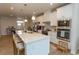 Bright kitchen with a large island, modern appliances, and pendant lighting at 341 Golan Circle # B, Myrtle Beach, SC 29579