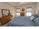 Comfortable main bedroom with dresser and large windows at 341 Golan Circle # B, Myrtle Beach, SC 29579
