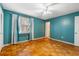 This bedroom features hardwood floors, a closet and a window at 3494 Cactus St. # 3494, Myrtle Beach, SC 29577